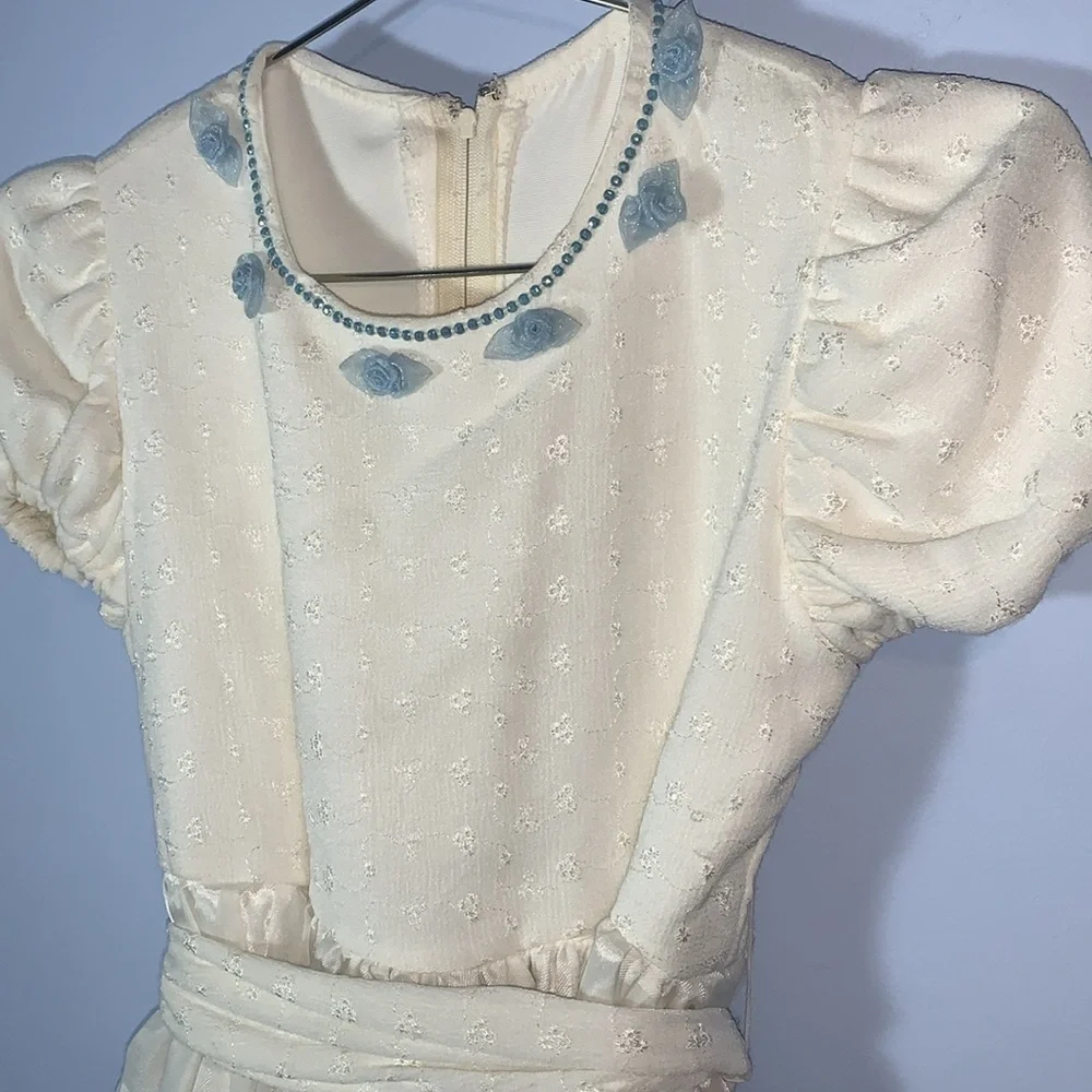 Vintage handmade girls puff sleeve white Cream Dress with Blue Floral rosette’s